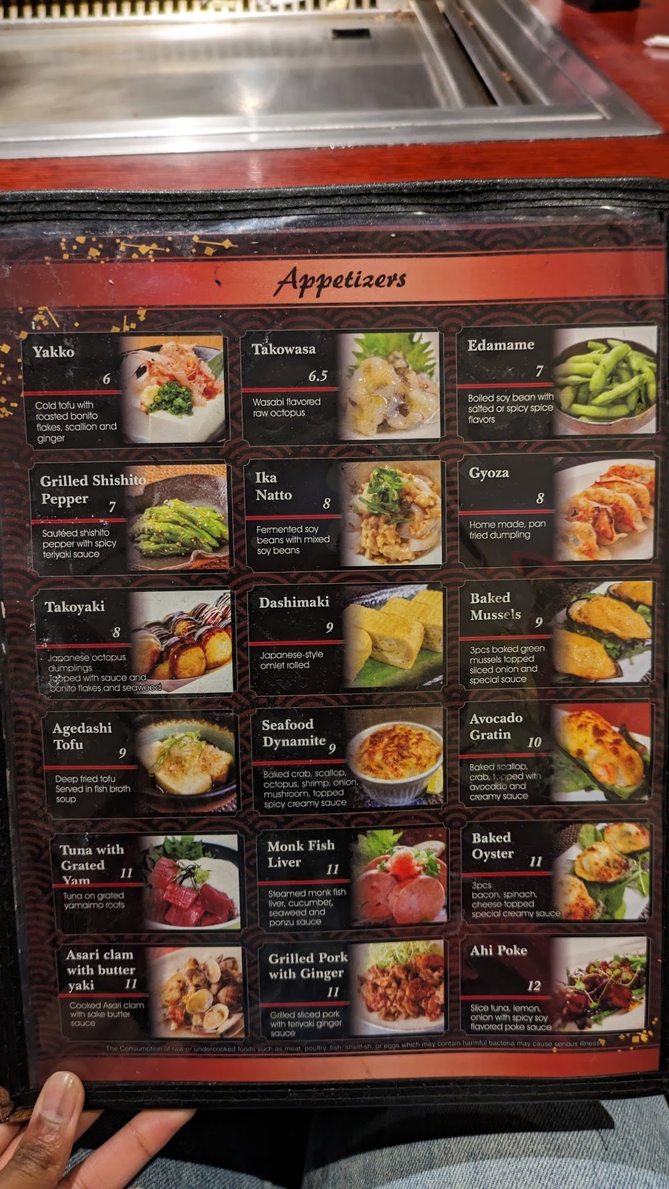 Japanese menu featuring hibachi, seafood, and chicken.