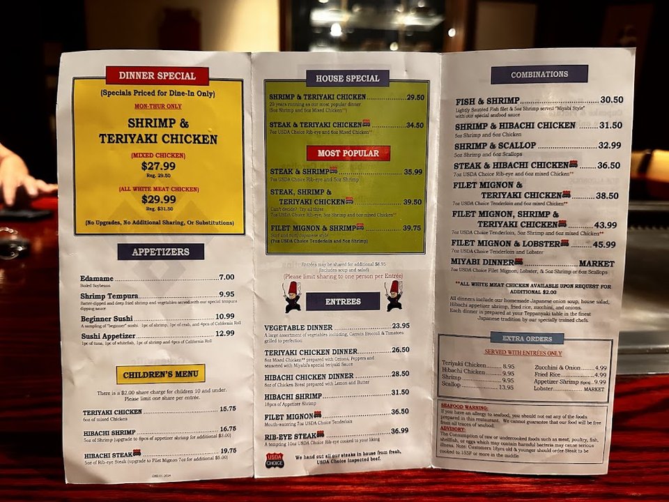 Menu page listing grilled fish and house specials.