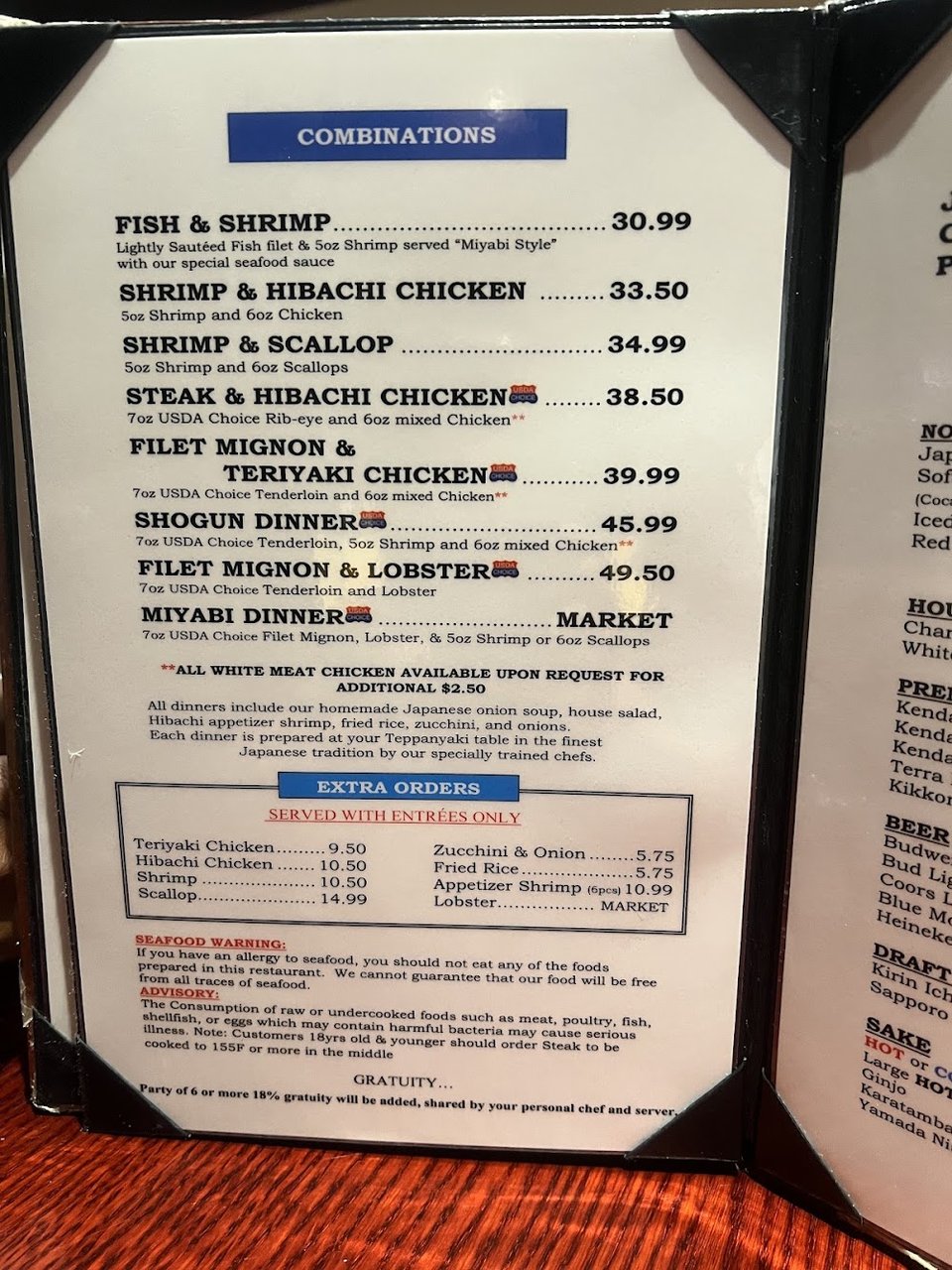 Children's menu and celebration items on display.
